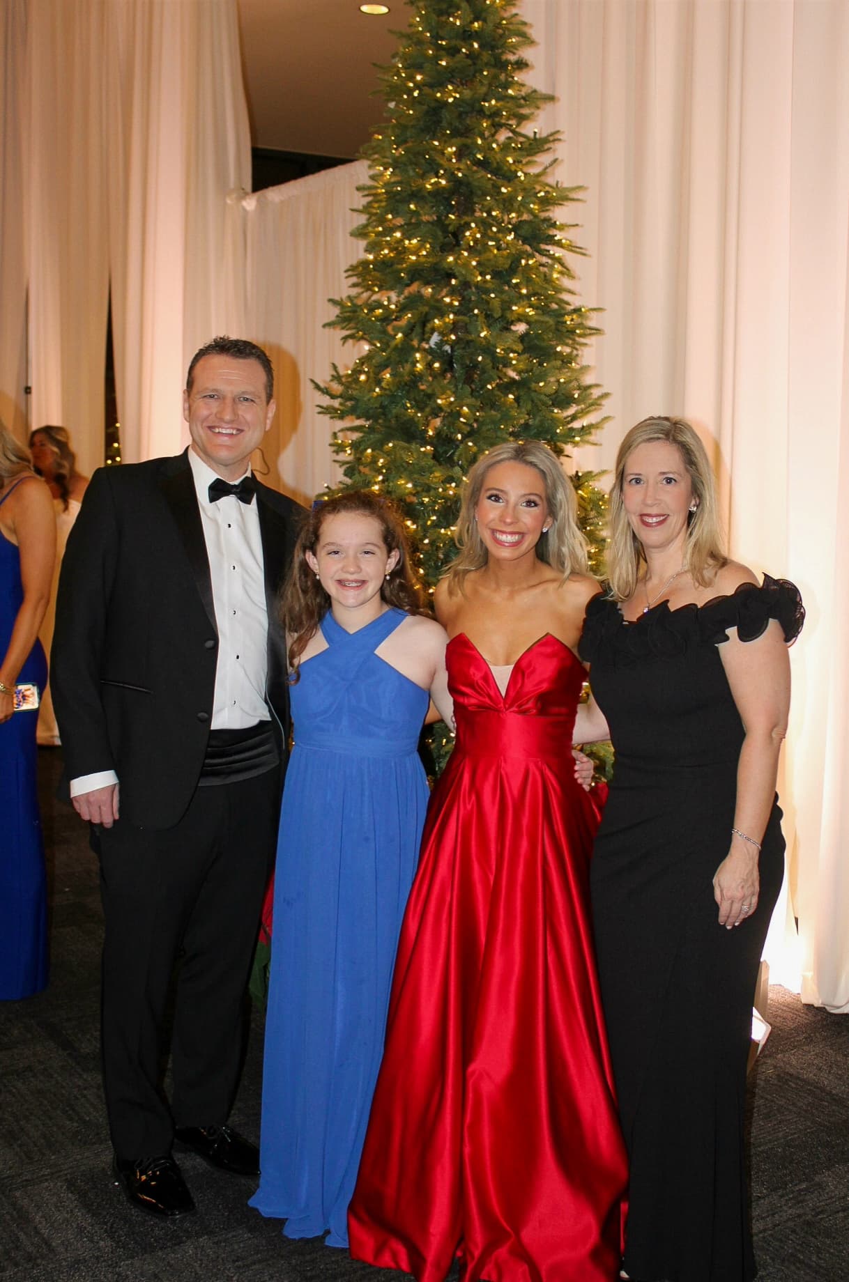 Michael with Kristin, Ella, and Ava at the debutante ball